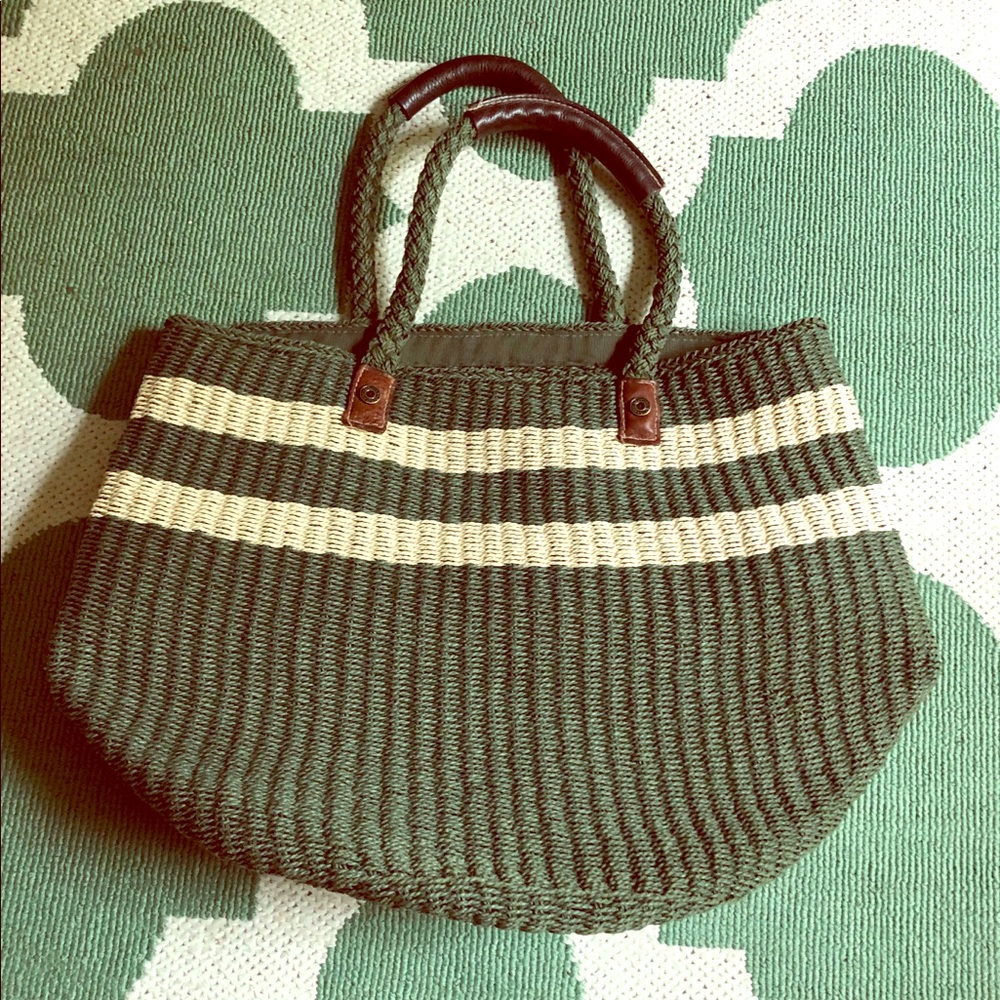 Large straw tote bag in green.